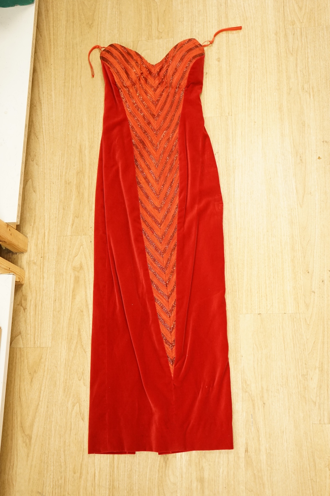 A 1960's/70's evening dress and jacket, with a red velvet dress